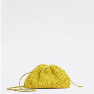 BOTTEGA VENETA
MINI POUCH CURLY RAFFIA EFFECT CLUTCH
